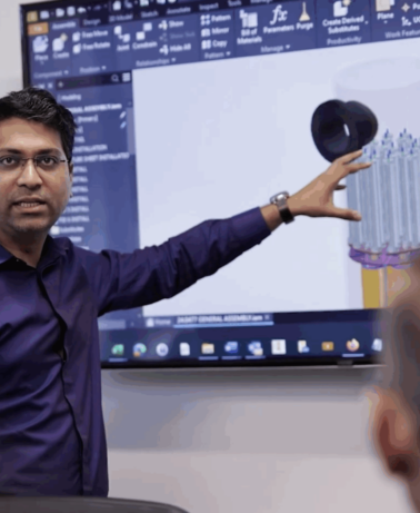 Engineer giving presentation on separation technology rendering design and functionality.