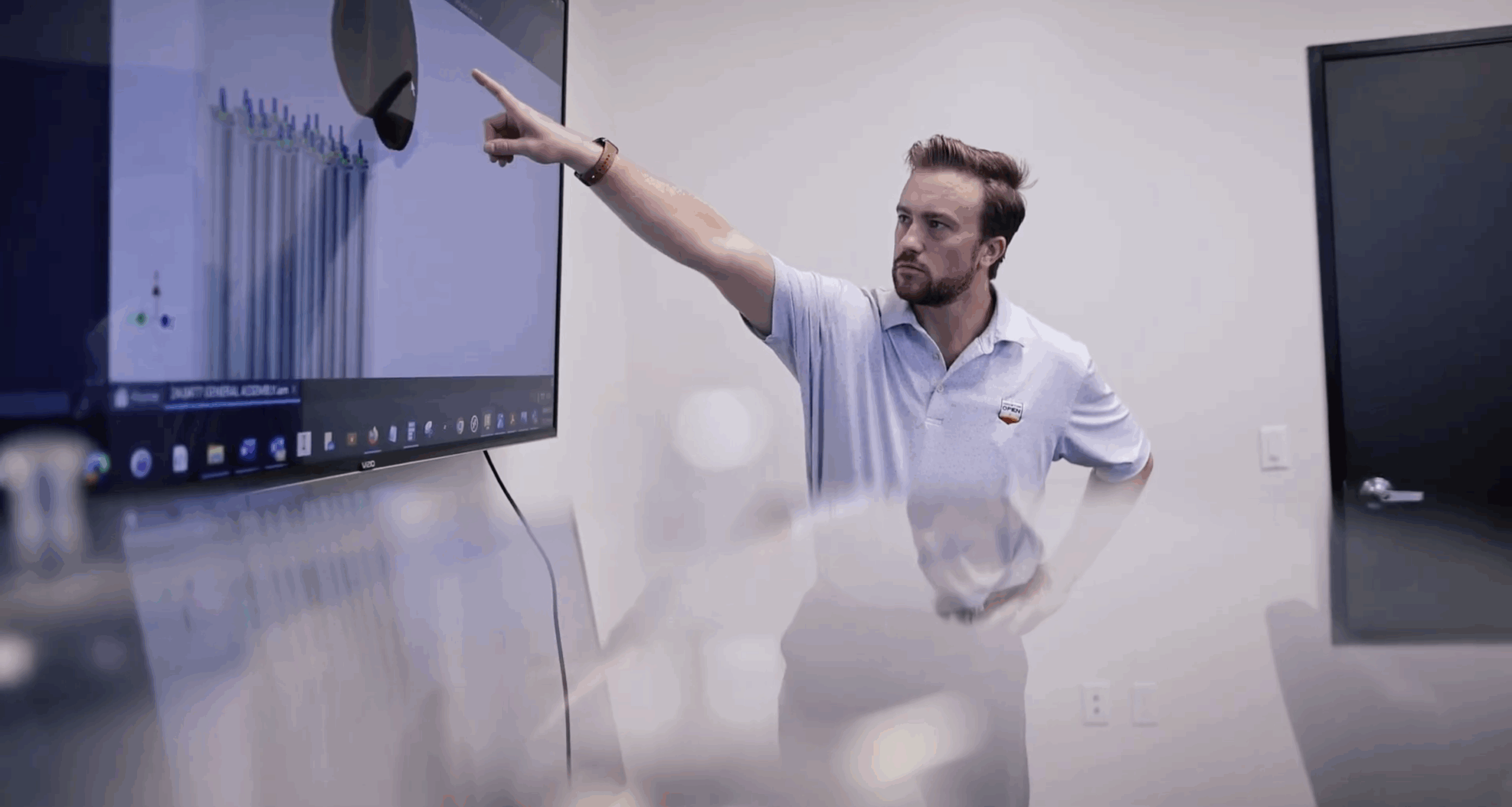 Team members reviewing technical drawings in Transcend Solutions facility. {{brizy_dc_image_alt imageSrc=