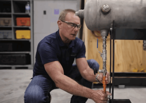 Engineer working on separations technology components. {{brizy_dc_image_alt imageSrc=