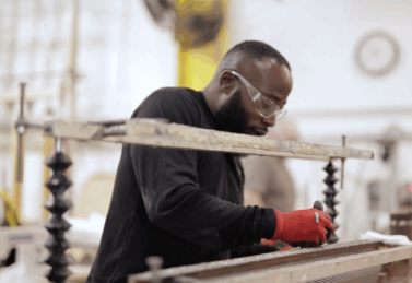 Technician trimming separation media using precision cutting tools. {{brizy_dc_image_alt imageSrc=