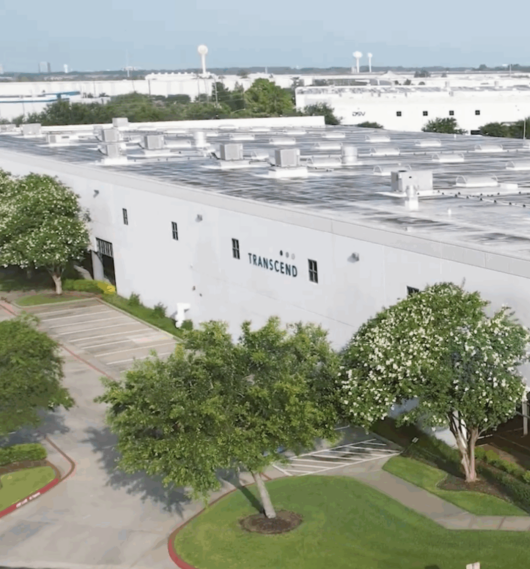 Aerial view of Transcend Solutions facility showing the building and surrounding area.